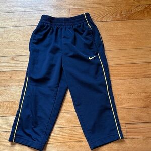 Nike Boys Navy Track Pants with Yellow Piping